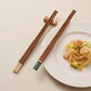 Five pairs of wooden chopsticks for sushi noodles and rice