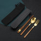A 4-piece stainless steel cutlery set with brown wooden handles, shown with a black mesh carrying case and a black rectangular case on a dark textured background.