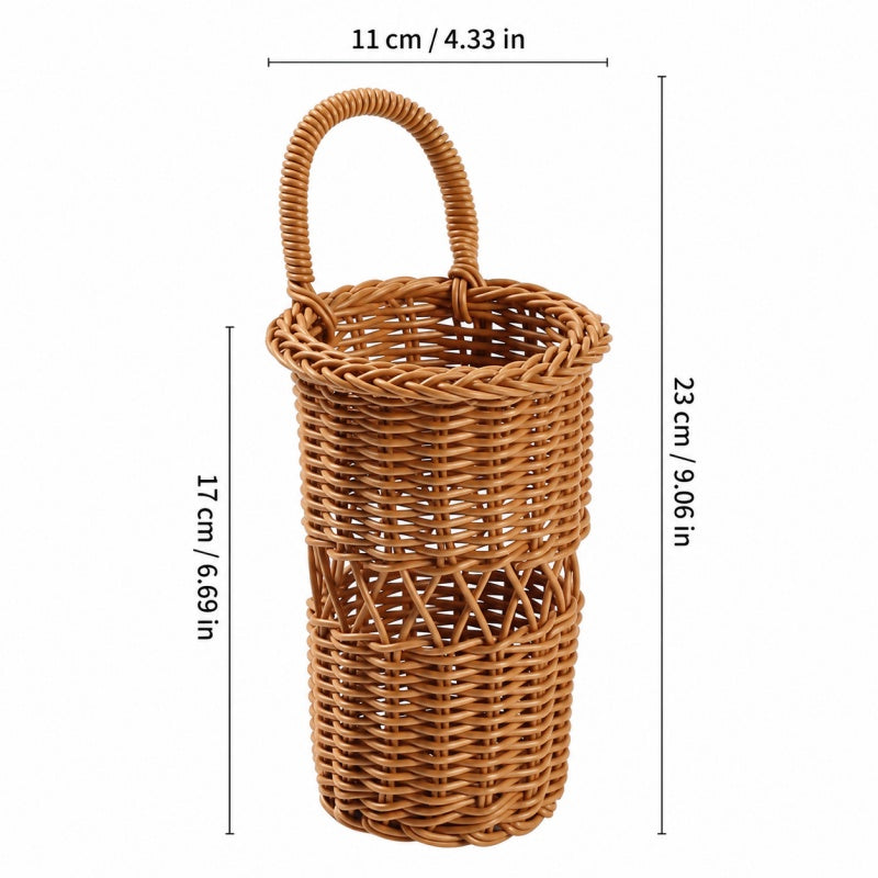 A natural wicker basket with a single loop handle, shown with dimension lines indicating a height of 23 cm (9.06 in) and a width of 11 cm (4.