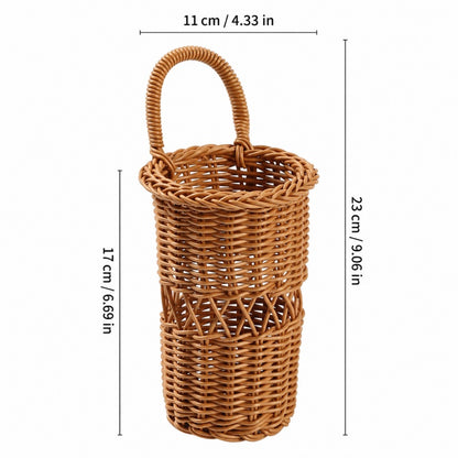 A natural wicker basket with a single loop handle, shown with dimension lines indicating a height of 23 cm (9.06 in) and a width of 11 cm (4.