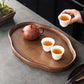 Irregular bamboo and wood serving tray with walnut finish