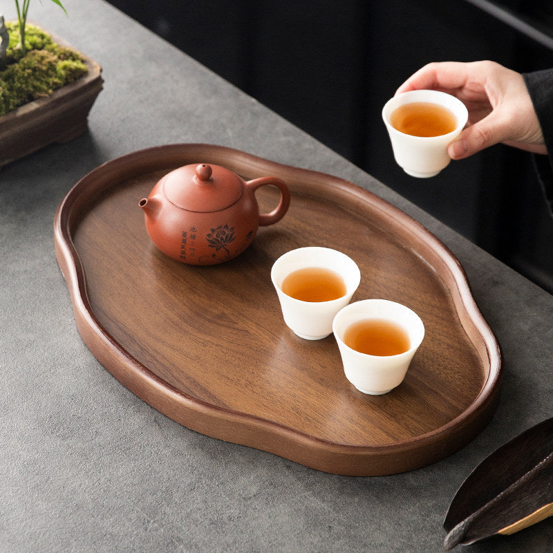Irregular bamboo and wood serving tray with walnut finish